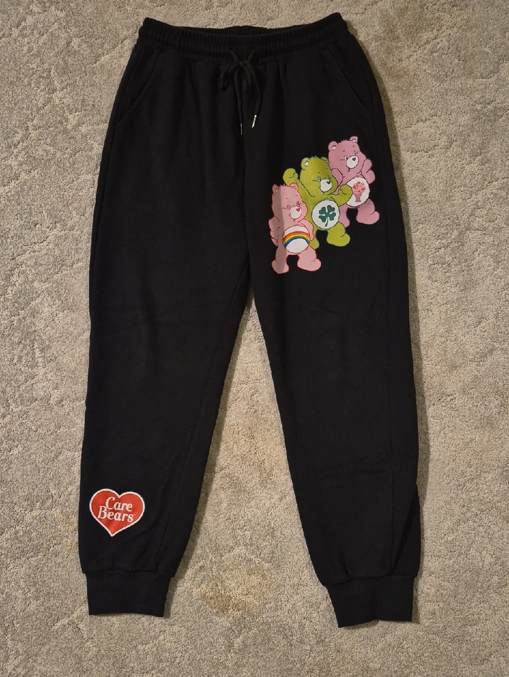 Care Bears Black Sweatpants with Pink & Green Character Prints.